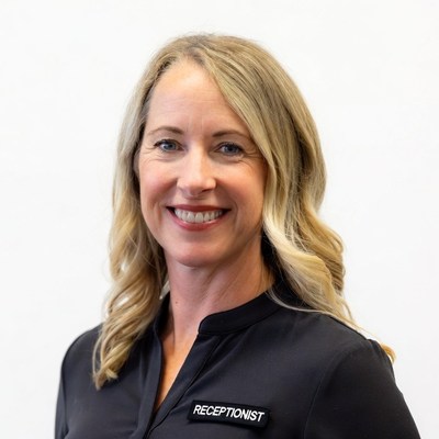 Smiling blonde receptionist woman