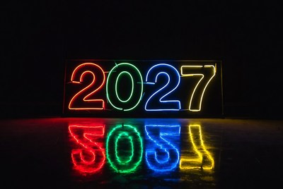 Colorful Neon 2027 Sign Reflection