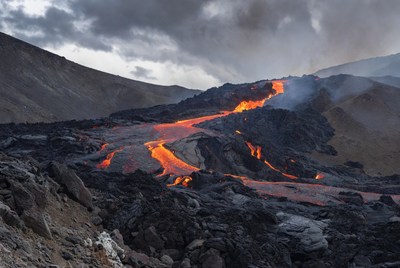 Lava Flowing Down Volcanic Mountain