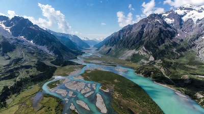 Aerial View of Turquoise River in Mountains