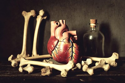 Realistic Heart with Bones and Glass Jar