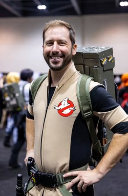 Man in Ghostbusters cosplay at convention