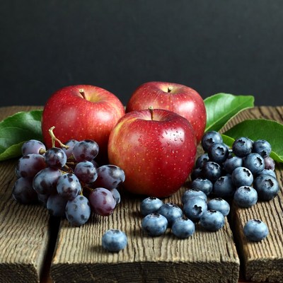 Red Apples Grapes Blueberries on Wood