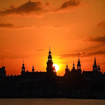 Sunset Silhouette of Gothic City Skyline
