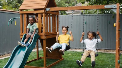 African-American kids playing on playground