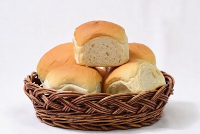 Fresh bread rolls in basket
