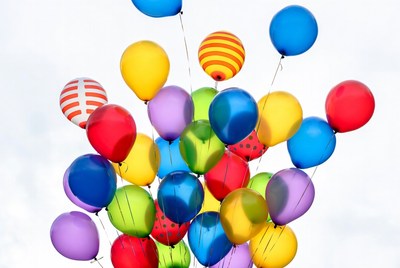 Colorful Balloons Cluster on White Background