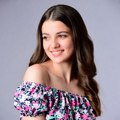 Smiling woman in floral off-shoulder top