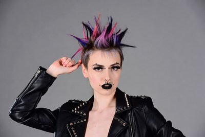 Woman with pink mohawk and leather jacket