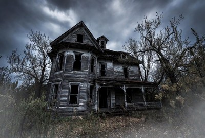 Abandoned Victorian House in Foggy Woods