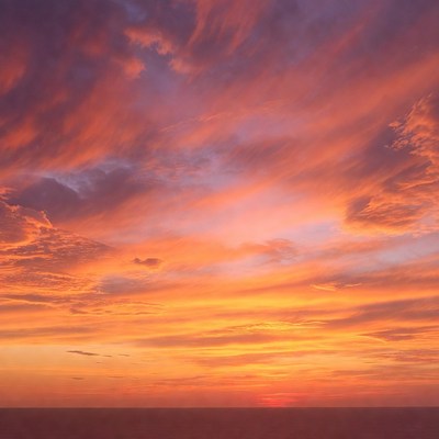 Vibrant Sunset Over Horizon