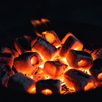 Glowing Charcoal Briquettes in Fire