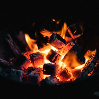 Glowing Burning Charcoal Briquettes