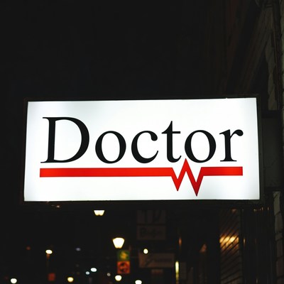 Doctor Sign with Heartbeat at Night