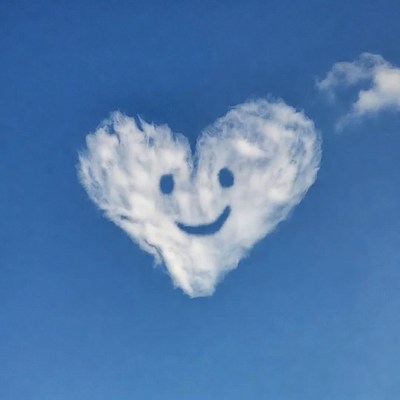 Smiling Heart Cloud in Blue Sky