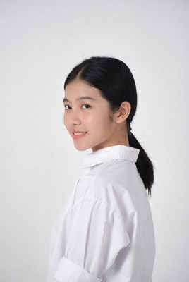 Asian girl smiling in white blouse