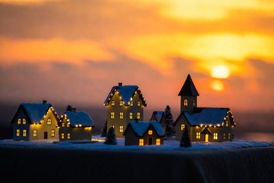 Miniature Christmas village at sunset