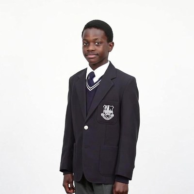 African boy in school uniform