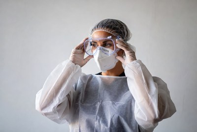 Woman wearing full PPE gear