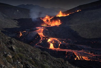 Lava Flowing from Volcano at Night