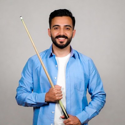 Man holding pool cue