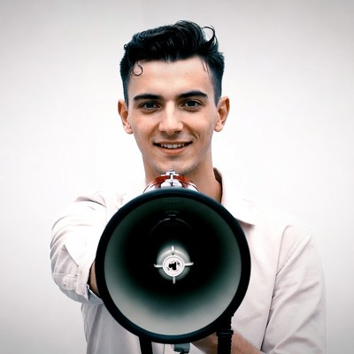 Young man holding megaphone
