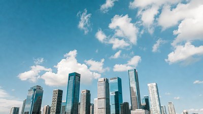 Skyscrapers under blue cloudy sky