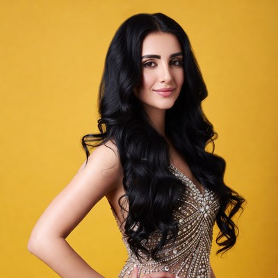 Woman in sparkling dress on yellow background