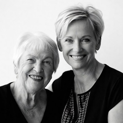Elderly woman and middle-aged woman smiling