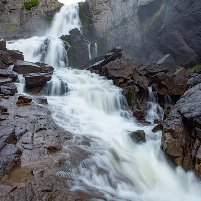 Waterfall cascading over rocky cliffs