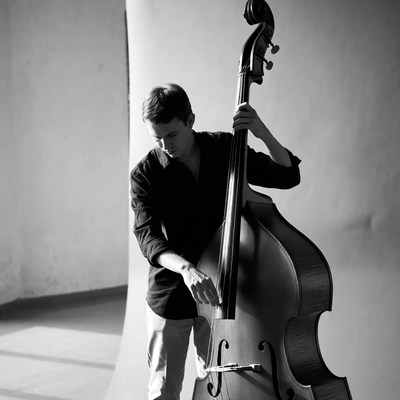 Young man playing double bass