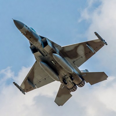 F-16 fighter jet flying overhead