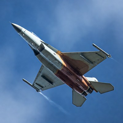 F-16 fighter jet flying upward