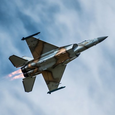 Jet fighter flying with afterburners