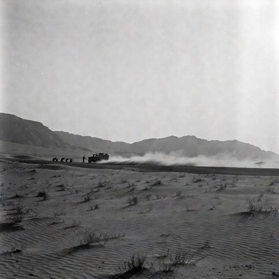 Soldiers with jeep in desert