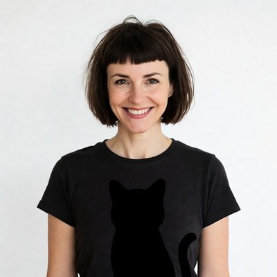 Woman smiling in black cat t-shirt