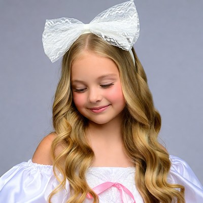 Blonde girl with large white lace bow