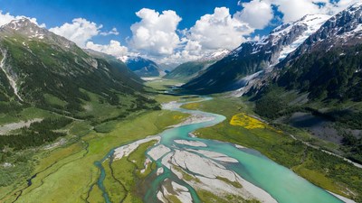 Aerial View of Turquoise River in Mountains