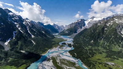 Aerial View of Glacial River in Mountains