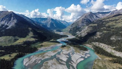 Turquoise River Winding Through Mountains