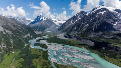 Turquoise River in Snowy Mountains