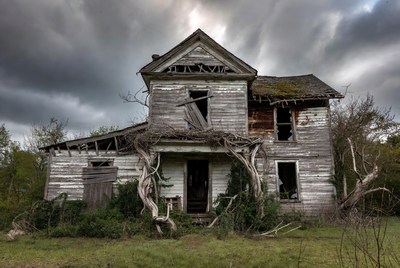 Abandoned haunted house in storm