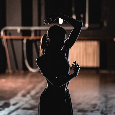 Woman dancing ballet silhouette studio