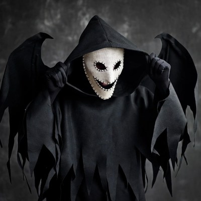 Person in winged hooded ghost mask