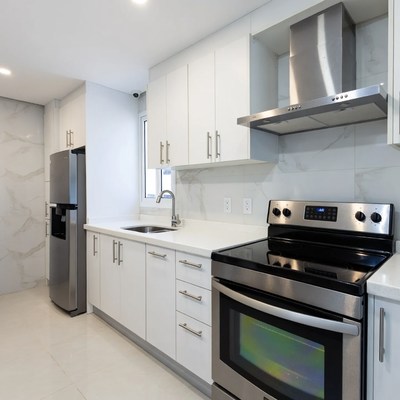 Modern White Kitchen with Stainless Appliances
