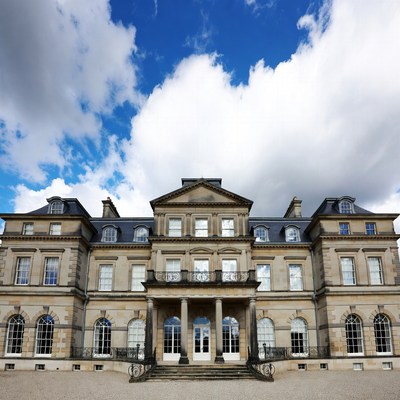 Grand Stone Mansion with Blue Sky