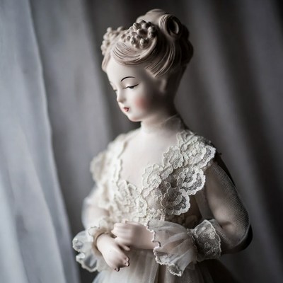 Porcelain Doll in Lace Dress