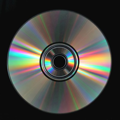 Shiny CD Disc on Black Background