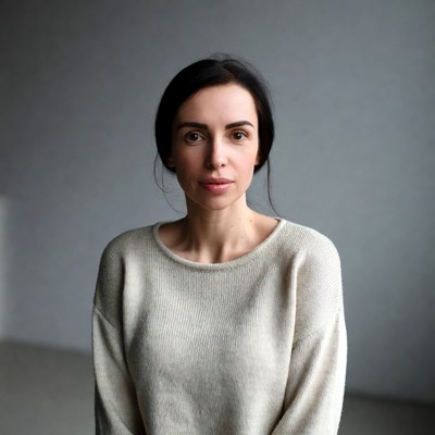 Woman in white sweater portrait