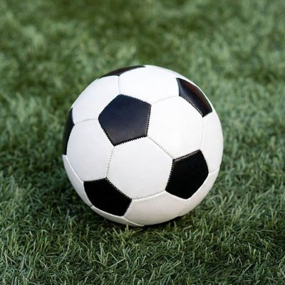 Soccer ball on green grass